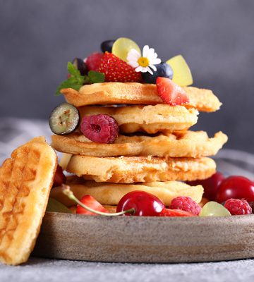 fresh belgian waffles with berries for breakfast